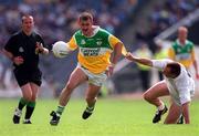 16 July 2000; Mel Keenaghan of Offaly in action against Glenn Ryan of Kildare during the Bank of Ireland Leinster Senior Football Championship Semi-Final Replay match between Kildare and Offaly at Croke Park in Dublin. Photo by Ray McManus/Sportsfile