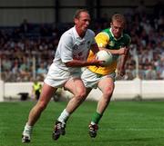 16 July 2000; Willie McCreery of Kildare in action against Ronan Mooney of Offaly during the Bank of Ireland Leinster Senior Football Championship Semi-Final Replay match between Kildare and Offaly at Croke Park in Dublin. Photo by John Mahon/Sportsfile