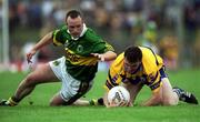 16 July 2000; Brian Considine of Clare in action against John Crowley of Kerry during the Bank of Ireland Munster Senior Football Championship Final between Kerry and Clare at the Gaelic Grounds in Limerick. Photo by Ray Lohan/Sportsfile
