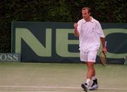 15 July 2000; Scott Barron if Ireland celebrates his set winning point which Ireland won 7-5 in a tie-break during the Ireland v Croatia - Davis Cup Doubles match at Fitzwilliam Lawn Tennis Club in Dublin. Photo By Brendan Moran/Sportsfile