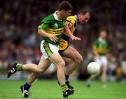 16 July 2000; Eamonn Fitzmaurice of Kerry in action against Martin Daly of Clare during the Bank of Ireland Munster Senior Football Championship Final between Kerry and Clare at the Gaelic Grounds in Limerick. Photo By Brendan Moran/Sportsfile