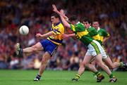 16 July 2000; Brian McMahon of Clare in action against Killian Burns and Tom O'Sullivan of Kerry during the Bank of Ireland Munster Senior Football Championship Final between Kerry and Clare at the Gaelic Grounds in Limerick. Photo by Ray Lohan/Sportsfile