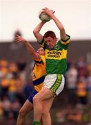 16 July 2000; Noel Kennelly of Kerry in action against Barry Keating of Clare during the Bank of Ireland Munster Senior Football Championship Final between Kerry and Clare at the Gaelic Grounds in Limerick. Photo by Ray Lohan/Sportsfile