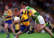 16 July 2000; Ronan Slattery of Clare in action against Dara O'Cinneide of Kerry during the Bank of Ireland Munster Senior Football Championship Final between Kerry and Clare at the Gaelic Grounds in Limerick. Photo By Brendan Moran/Sportsfile