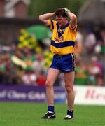 16 July 2000; Joe Considine of Clare leaves the field dejected following the Bank of Ireland Munster Senior Football Championship Final between Kerry and Clare at the Gaelic Grounds in Limerick. Photo By Brendan Moran/Sportsfile