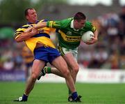 16 July 2000; Dara O'Se of Kerry in action against Martin Daly of Clare during the Bank of Ireland Munster Senior Football Championship Final between Kerry and Clare at the Gaelic Grounds in Limerick. Photo By Brendan Moran/Sportsfile