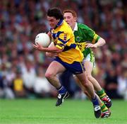 16 July 2000; Mark O'Connell of Clare in action against Noel Kennelly of Kerry during the Bank of Ireland Munster Senior Football Championship Final between Kerry and Clare at the Gaelic Grounds in Limerick. Photo By Brendan Moran/Sportsfile