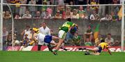 16 July 2000; Aodan MacGearailt of Kerry shoots to score his sides second goal during the Bank of Ireland Munster Senior Football Championship Final between Kerry and Clare at the Gaelic Grounds in Limerick. Photo By Brendan Moran/Sportsfile