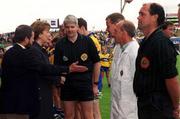 16 July 2000; President of Ireland Mary McAleese is introduced to referee John Bannon and the match officials by Sean Kelly, Munster Council Chairman ahead of the Bank of Ireland Munster Senior Football Championship Final between Kerry and Clare at the Gaelic Grounds in Limerick. Photo By Brendan Moran/Sportsfile