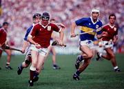 6 August 1989; Joe Cooney of Galway in action against Conor Donovan of Tipperary the All-Ireland Senior Hurling Championship Semi-Final match between Tipperary and Galway at Croke Park in Dublin. Photo by Ray McManus/Sportsfile