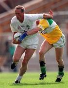 16 July 2000; Willie McCreery of Kildare in action against Cathal Daly of Offaly during the Bank of Ireland Leinster Senior Football Championship Semi-Final Replay match between Kildare and Offaly at Croke Park in Dublin. Photo by Ray McManus/Sportsfile