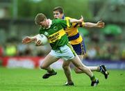 16 July 2000; Michael Frank Russell of Kerry in action against Conor Whelan of Clare during the Bank of Ireland Munster Senior Football Championship Final between Kerry and Clare at the Gaelic Grounds in Limerick. Photo By Brendan Moran/Sportsfile