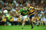 16 July 2000; John Crowley of Kerry in action against Padraig Gallagher of Clare during the Bank of Ireland Munster Senior Football Championship Final between Kerry and Clare at the Gaelic Grounds in Limerick. Photo By Brendan Moran/Sportsfile