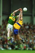 16 July 2000; Tomas O'Se of Kerry contests a high ball with Ger Keane of Clare during the Bank of Ireland Munster Senior Football Championship Final between Kerry and Clare at the Gaelic Grounds in Limerick. Photo By Brendan Moran/Sportsfile