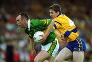 16 July 2000; John Crowley of Kerry in action against Conor Whelan of Clare during the Bank of Ireland Munster Senior Football Championship Final between Kerry and Clare at the Gaelic Grounds in Limerick. Photo By Brendan Moran/Sportsfile