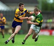 16 July 2000; Michael F Russell of Kerry in action against Conor Whelan of Clare during the Bank of Ireland Munster Senior Football Championship Final between Kerry and Clare at the Gaelic Grounds in Limerick. Photo By Brendan Moran/Sportsfile