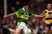 16 July 2000; Aodan MacGearailt of Kerry shoots to score his side's second goal during the Bank of Ireland Munster Senior Football Championship Final between Kerry and Clare at the Gaelic Grounds in Limerick. Photo by Ray Lohan/Sportsfile