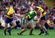 16 July 2000; Noel Kennelly of Kerry in action against Barry Keating, left, and Donal O'Sullivan of Clare during the Bank of Ireland Munster Senior Football Championship Final between Kerry and Clare at the Gaelic Grounds in Limerick. Photo By Brendan Moran/Sportsfile