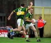 16 July 2000; Liam Hassett of Kerry, right, celebrates with team-mate John Crowley after scoring his sides first goal during the Bank of Ireland Munster Senior Football Championship Final between Kerry and Clare at the Gaelic Grounds in Limerick. Photo By Brendan Moran/Sportsfile