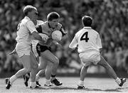 26 July 2000; Dessie Farrell of Dublin is tackled by Seamus Dowling, right, and John Crofton of Kildare during the Leinster Senior Football Championship Final match between Dublin and Kildare at Croke Park in Dublin. Photo by Ray McManus/Sportsfile