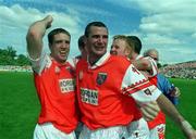 16 July 2000; Armagh players Kieran McGeeney, left, and Steven McDonnell celebrate with team-mates following the Bank of Ireland Ulster Senior Football Championship Final match between Armagh and Derry at St Tiernach's Park in Clones, Monaghan. Photo by Damien Eagers/Sportsfile