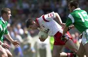 13 May 2000; Ciaran Gourley of Tyrone in action against Colm Hickey of Limerick during the All-Ireland U21 Football Championship Final between Tyrone and Limerick at Cusack Park in Mullingar, Westmeath.  Photo by Ray McManus/Sportsfile
