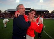 19 July 2000; Richie Baker of Shelbourne celebrates with Sherlbourne manager Dermot Keely following the UEFA Champions League 1st Qualifying Round 2nd Leg match between Shelbourne and Sloga Jugomagnat at Tolka Park in Dublin. Photo by Damien Eagers/Sportsfile