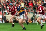 1 September 1996; Michael Ryan of Tipperary breaks clear of the Galway defence during the All-Ireland Minor Hurling Championship Final match between Tipperary and Galway at Croke Park in Dublin. Photo by David Maher/Sportsfile