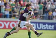1 June 2008; Joe Sheridan, Meath, tackles Wexford goalkeeper Anthony Masterson to dispossess him before kicking the ball to the net and ultimately have the 'goal' disallowed. GAA Football Leinster Senior Championship Quarter-Final, Meath v Wexford, Dr. Cullen Park, Carlow. Picture credit: Matt Browne / SPORTSFILE