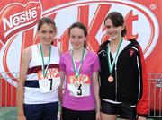 31 May 2008; S. Buggy, Castlecomer CC, Co. Kilkenny, who won the Junior Girls Triple Jump, with 2nd place E. Reid, left, Belfast Royal Academy, and C. Robinson, right, Regent House Grammer School, Co. Down, who finished third. Kit Kat Irish Schools Track & Field Final, Tullamore Harriers Stadium, Tullamore, Co. Offaly. Photo by Sportsfile