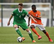 7 May 2015; Conor Masterson, Republic of Ireland, in action against Nigel Robertha, The Netherlands. UEFA European U17 Championship Finals Group D, Republic of Ireland v Netherlands. Sozopol Stadium, Sozopol, Bulgaria. Picture credit: Pat Murphy / SPORTSFILE