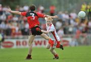 8 June 2008; Diarmaid McNulty, Tyrone, in action against Anton McArdle, Down. ESB Ulster Minor Football Championship Quarter-Final, Tyrone v Down, Healy Park, Omagh, Co. Tyrone. Picture credit: Brian Lawless / SPORTSFILE