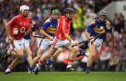 8 June 2008; Ben O'Connor races clear of the Tipperary fiull-back Paul Curran en-route to scoring the first goal of the game for Cork. Tipperary. GAA Hurling Munster Senior Championship Semi-Final, Cork v Tipperary, Pairc Ui Chaoimh, Cork. Picture credit: Ray McManus / SPORTSFILE