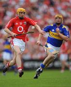 8 June 2008; Cathal Naughton, Cork, in action against Eamonn Corcoran, Tipperary. GAA Hurling Munster Senior Championship Semi-Final, Cork v Tipperary, Pairc Ui Chaoimh, Cork. Picture credit: Ray McManus / SPORTSFILE