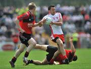 8 June 2008; Kyle Coney, Tyrone, in action against Pauric O'Rourke, Down. ESB Ulster Minor Football Championship Quarter-Final, Tyrone v Down, Healy Park, Omagh, Co. Tyrone. Picture credit: Brian Lawless / SPORTSFILE