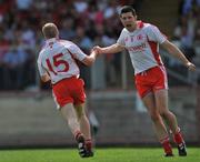 8 June 2008; Tyrone's Colm McCullagh, left, celebrates with team-mate Sean Cavanagh after scoring his side's first goal. GAA Football Ulster Senior Championship Quarter-Final, Tyrone v Down, Healy Park, Omagh, Co. Tyrone. Picture credit: Brian Lawless / SPORTSFILE