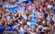 8 June 2008; A Dublin fan waves her flag during the game against Louth. GAA Football Leinster Senior Championship Quarter-Final, Louth v Dublin, Croke Park, Dublin. Picture credit: Matt Browne / SPORTSFILE