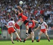 8 June 2008; Dan Gordon, Down, in action against Colin Holmes, Tyrone. GAA Football Ulster Senior Championship Quarter-Final, Tyrone v Down, Healy Park, Omagh, Co. Tyrone. Picture credit: Brian Lawless / SPORTSFILE