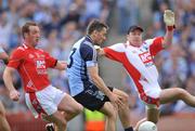 8 June 2008; Alan Brogan, Dublin, beats Mark Stanfield, left, and Stuart Reynolds, Louth, to score his side's only goal of the game. GAA Football Leinster Senior Championship Quarter-Final, Louth v Dublin, Croke Park, Dublin. Picture credit: David Maher / SPORTSFILE
