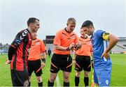 8 May 2015; Welsh referee Ryan Stewart, centre, ahead of the coin toss with with the captains Derek Pender, Limerick FC, right, and Shane Duggan, Bohemians as his fellow Welsh officials Martin Roberts, right, and John Jones look on. SSE Airtricity League Premier Division, Bohemians v Limerick FC, Dalymount Park, Dublin. Picture credit: David Maher / SPORTSFILE
