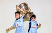 8 May 2015; Dublin supporters Jimmy Dunlea, aged 8, left, and Jose Dunlea, aged 6, from Blanchardstown with the National Football League division 1 trophy at a Dublin GAA open night. St. Brigidâ€™s GAA Club, Russell Park, Dublin. Picture credit: Piaras Ó Mídheach / SPORTSFILE