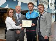 8 May 2015; Eithne Connolly, branch manager, Bank of Ireland DCU, and Michael Kennedy, DCU GAA Academy Director, in the company of Ross Munnelly, Fresher A football manager, right, presents a DCU GAA scholarship awards 2015 to Ryan Burns, Hunterstown Rovers, Louth. Dublin City University, Glasnevin, Dublin. Picture credit: Ray McManus / SPORTSFILE