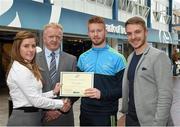 8 May 2015; Eithne Connolly, branch manager, Bank of Ireland DCU, and Michael Kennedy, DCU GAA Academy Director, in the company of Ross Munnelly, Fresher A football manager, right, presents a DCU GAA scholarship awards 2015 to Adam Byrne, Na Fianna, Dublin. Dublin City University, Glasnevin, Dublin. Picture credit: Ray McManus / SPORTSFILE