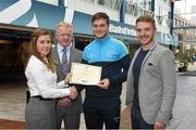 8 May 2015; Eithne Connolly, branch manager, Bank of Ireland DCU, and Michael Kennedy, DCU GAA Academy Director, in the company of Ross Munnelly, Fresher A football manager, right, presents a DCU GAA scholarship awards 2015 to Ultan Harney, Clann na nGael, Roscommon. Dublin City University, Glasnevin, Dublin. Picture credit: Ray McManus / SPORTSFILE