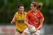 9 May 2015; Caroline O'Hanlon, Armagh, in action against Aoife McDonnell, Donegal. TESCO HomeGrown Ladies National Football League, Division 2 Final, Armagh v Donegal. Parnell Park, Dublin. Picture credit: Piaras Ó Mídheach / SPORTSFILE