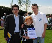 7 June 2008; Andrew Ramsey, St. Josephs Boys, was presented with his certificate by Alex Ericarde, Brand Manager, Danone Ireland, left and Keith Fahy, St. Patrick's Athletic, right. Danone Nations Cup National Finals, AUL Complex, Clonshaugh, Dublin. Picture credit: Ray McManus / SPORTSFILE