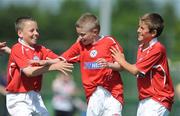 7 June 2008; Lee Delaney, centre, celebrates scoring the third goal for Shelbourne FC with his team-mates Jason Caffrey, left, and Regan Donelon during the Danone Nations Cup National Final. Shelbourne FC, Dublin, v Willow Park, Athlone, Co. Westmeath. AUL Complex, Clonshaugh, Dublin. Picture credit: Ray McManus / SPORTSFILE