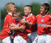7 June 2008; Lee Delaney, second from left, celebrates scoring the third goal for Shelbourne FC with his team-mates, l to r, Lloyd Buckley, Jason Caffrey and Regan Donelon during the Danone Nations Cup National Final. Shelbourne FC, Dublin, v Willow Park, Athlone, Co. Westmeath. AUL Complex, Clonshaugh, Dublin. Picture credit: Ray McManus / SPORTSFILE