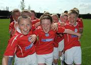 7 June 2008; Members of the Shelbourne FC team celebrate victory in the Danone Nations Cup National Final. Shelbourne FC, Dublin, v Willow Park, Athlone, Co. Westmeath. AUL Complex, Clonshaugh, Dublin. Picture credit: Ray McManus / SPORTSFILE