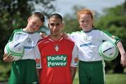 10 June 2008; eircom League stars come out in strength to support National Irish Bank FAI Summer Soccer Schools. At a photocall to promote this year's National Irish Bank Summer Soccer Schools are Jordan Dempsey, age 9, from Mulhuddart, and Jessica Gleeson, age 9, from Whitestown, with Joe O'Cearuill, St. Patrick's Athletic. Botanic Gardens, Dublin. Picture credit: Brian Lawless / SPORTSFILE